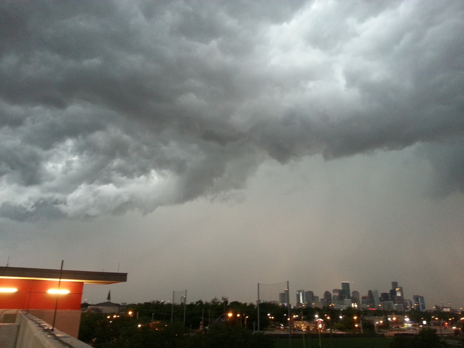 The 2021 Joint ARM User Facility/ASR Principal Investigators Meeting included numerous references to the TRacking Aerosol Convection interactions ExpeRiment (TRACER), which will begin in October 2021 in the Houston, Texas, area. This photo captures the Houston skyline and clouds of interest for TRACER. 