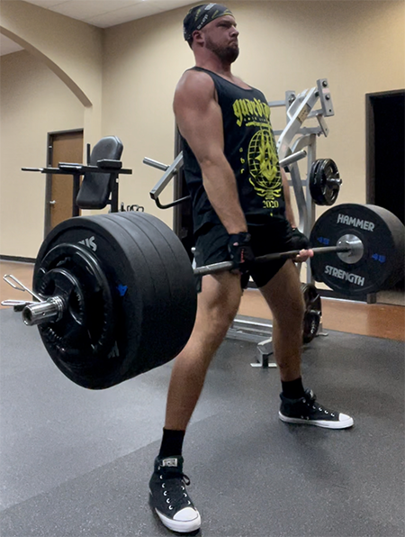 At the gym three or four days a week, in 2022 Dzambo runs through a powerlifting routine of deadlifts (as above), squats, and bench presses, and a variety of specialized workouts.