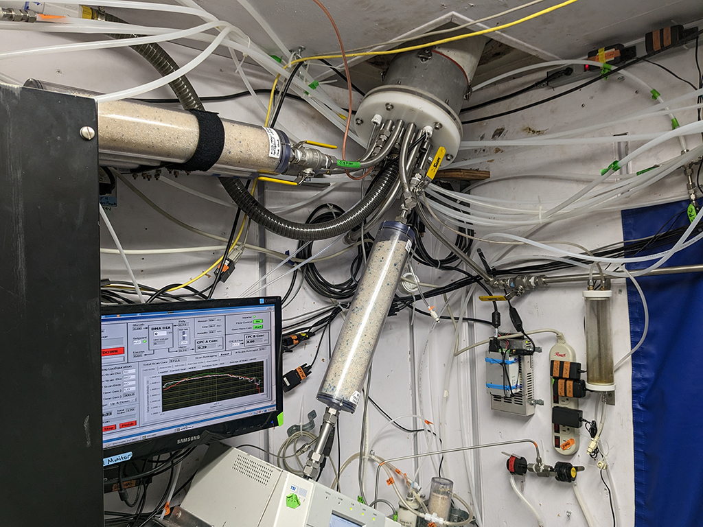 Inside an instrument container during EPCAPE, various intakes, filters, tubing, and data quickly grow complex. Photo is by Petters.