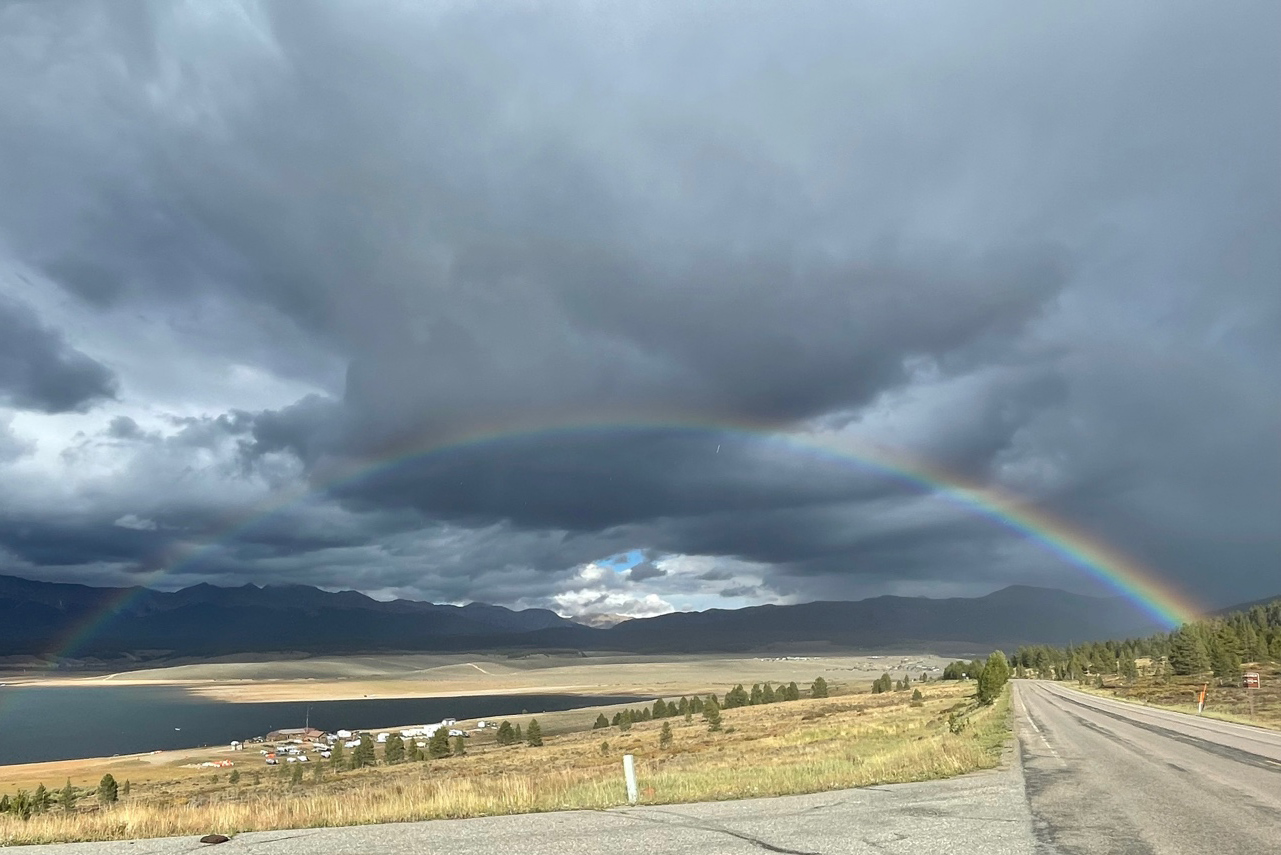 A rainbow appears after an afternoon thunderstorm over the Taylor Park Reservoir. Photo is courtesy of Daniel Feldman, Lawrence Berkeley National Laboratory.