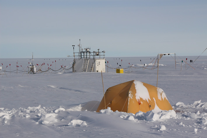 During the ARM West Antarctic Radiation Experiment (AWARE), researchers deployed instruments at two sites, including the West Antarctic Ice Sheet (WAIS), above. In the foreground is one of the Arctic tents that served as sleeping quarters for one resident at the ice camp. Photo courtesy of Lubin. 