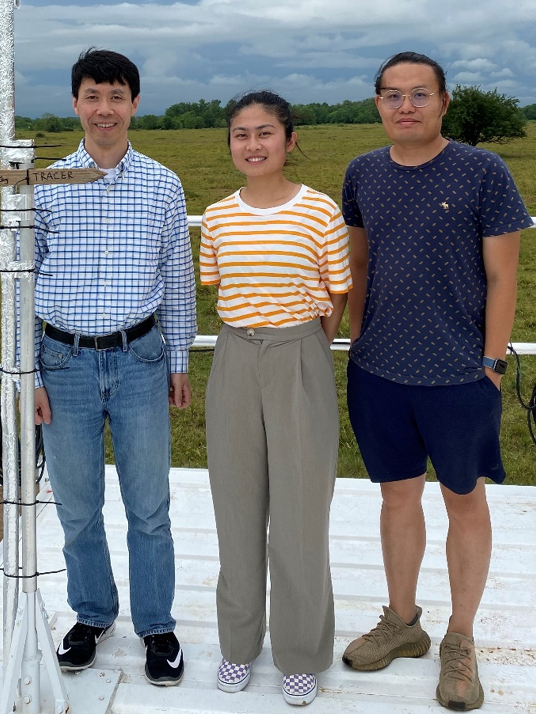 In the summer of 2022, Wang’s University of Washington in St. Louis team collected aerosol data using an ARM guest container in Guy, Texas. From left to right, are Wang, PhD student Jing Li, and postdoctoral researcher Xianda Gong. Photo is courtesy of Jian Wang. 